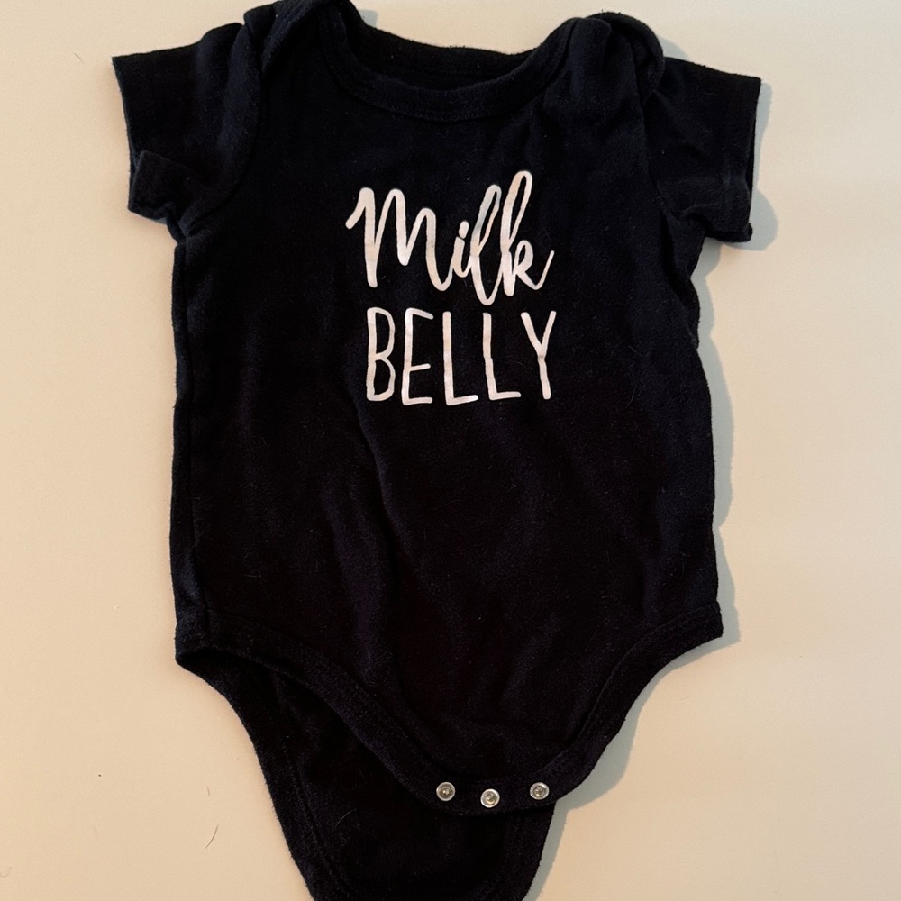 Charming Black Bodysuit with Milk Belly Print